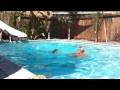 Marina Swims Across the Pool