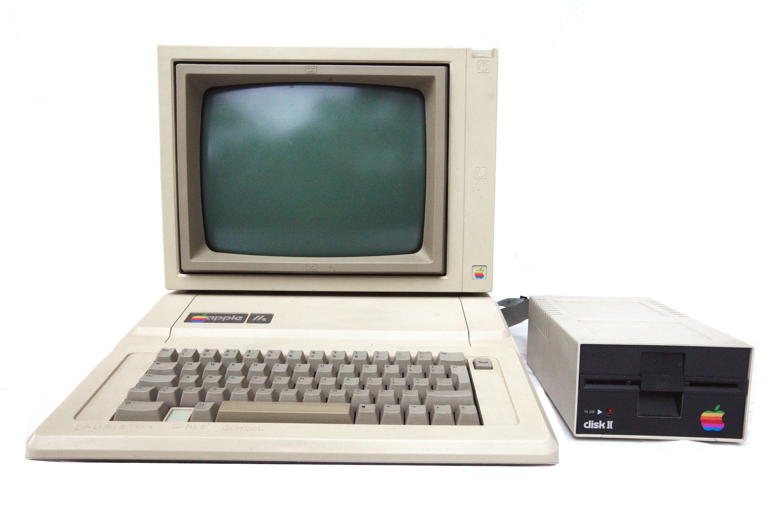 Apple IIe with one floppy drive and Apple's green monochrome monitor.